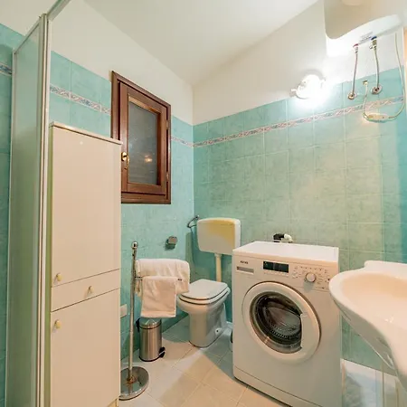 Appartamento Trilocale Le Canne 4 Posti Letto Con Giardino E Posto Auto Privato San Teodoro  Exterior photo
